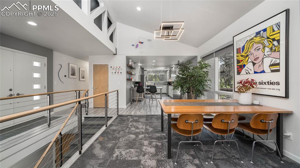7550 Dairy Ranch Road Colorado Springs, CO 80919 - Photo 8 of 39 a dining room with furniture and wooden floor