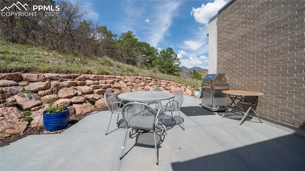 7550 Dairy Ranch Road Colorado Springs, CO 80919 - Photo 10 of 39 a view of a chairs and table in the patio