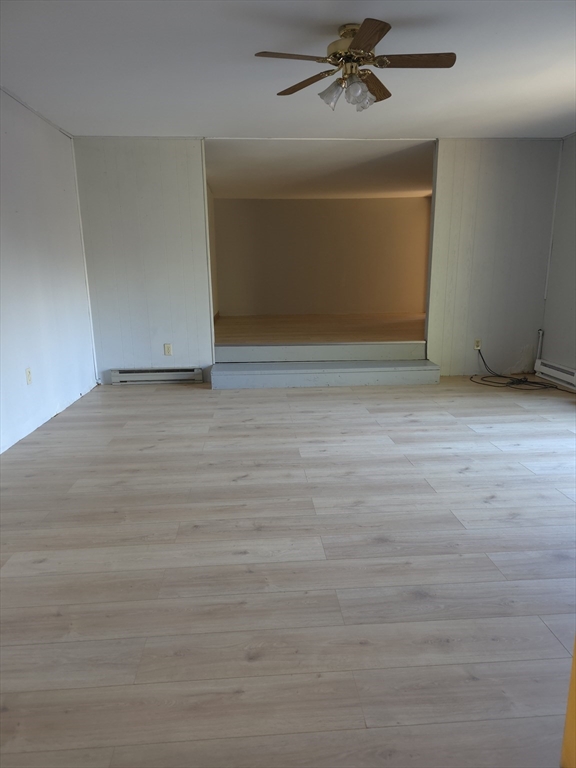3 Jacobson Drive, Unit 2 Auburn, MA 01501 - Photo 4 of 20 a view of a livingroom with an empty space