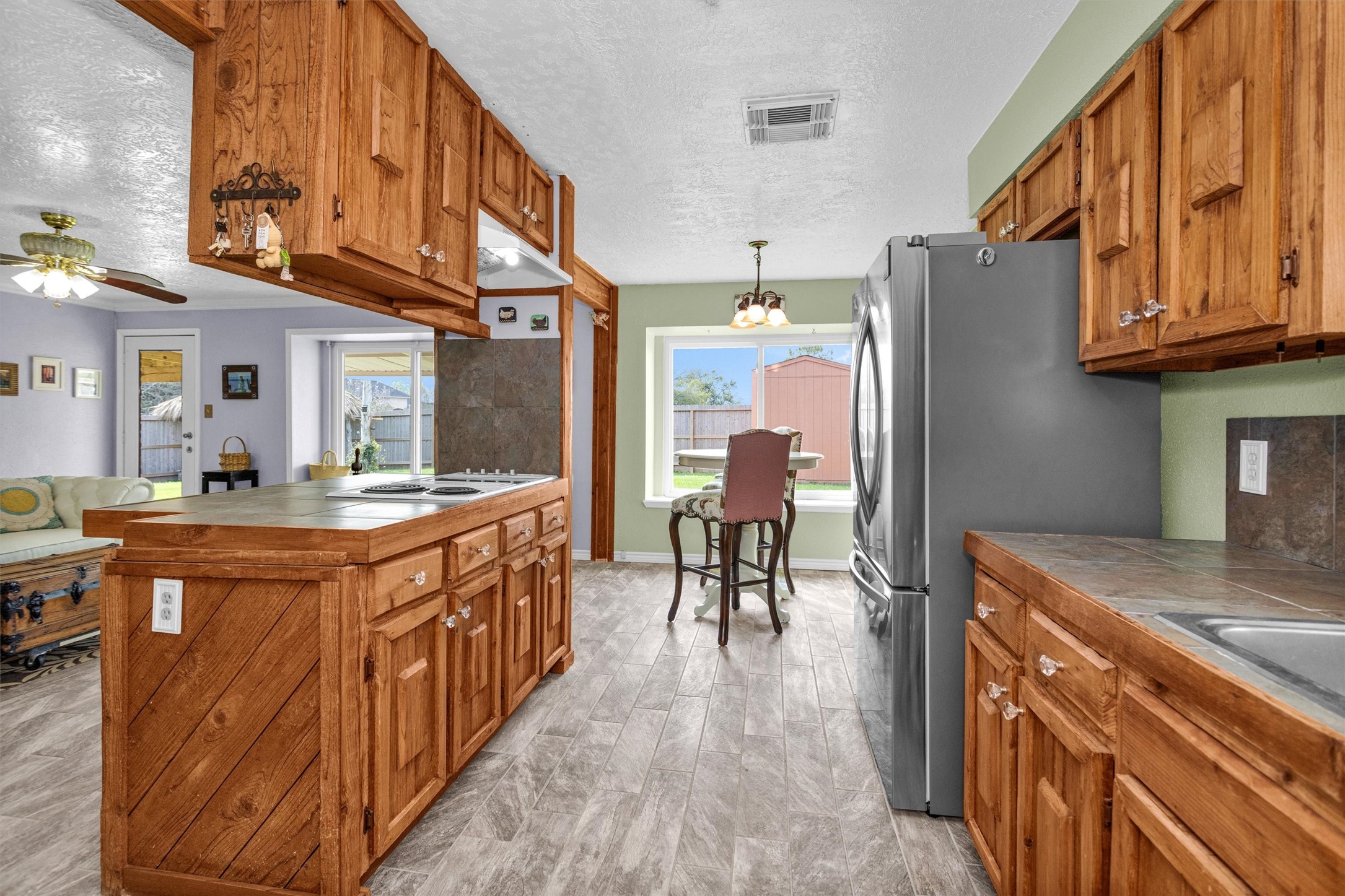 8422 Oakhaven Road La Porte, TX 77571 - Photo 16 of 46 Functional kitchen with ample cabinet space and plenty of room for meal prep.