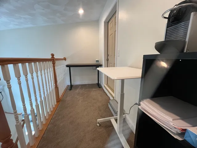 a view of a hallway with entryway