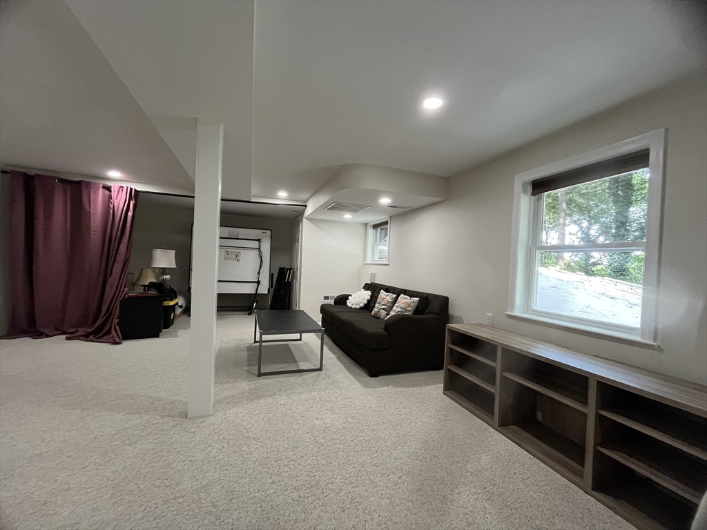 195 Grove Street, Unit 201 Cambridge, MA 02138 - Photo 18 of 20 a living room with furniture