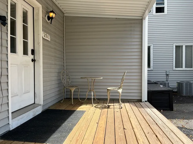 a balcony with view of a patio