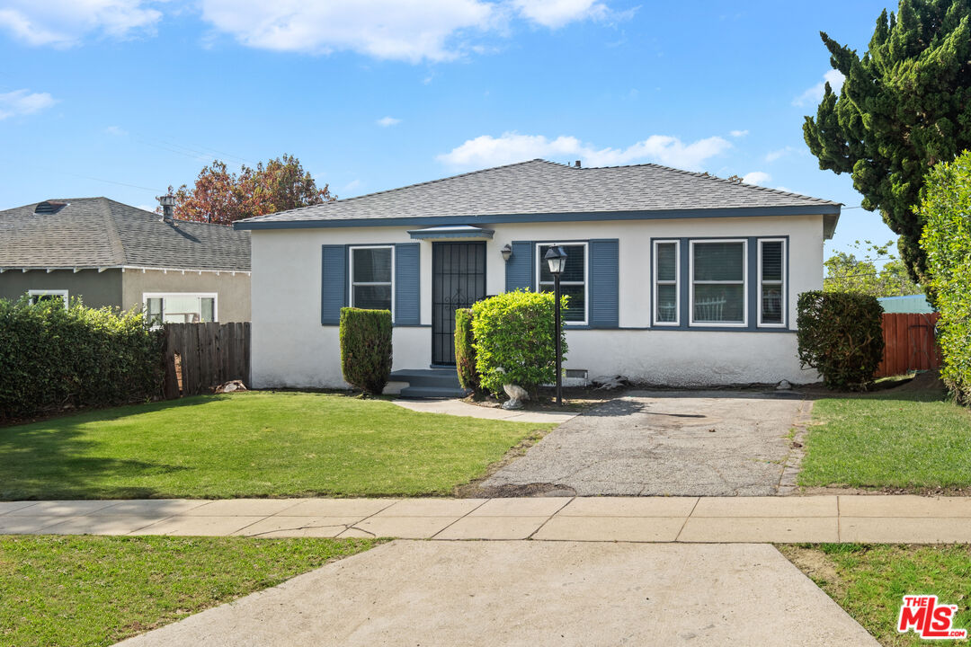 3493 Meier Street Los Angeles, CA 90066 - Photo 1 of 31 a front view of a house with garden