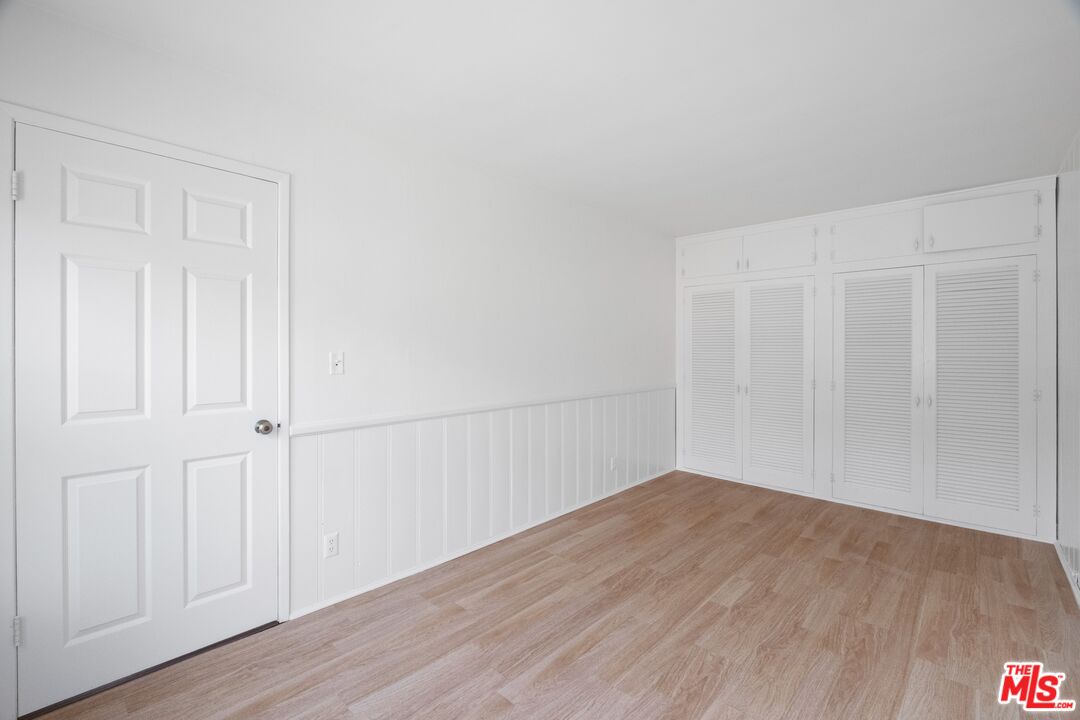 3493 Meier Street Los Angeles, CA 90066 - Photo 12 of 31 an empty room with wooden floor