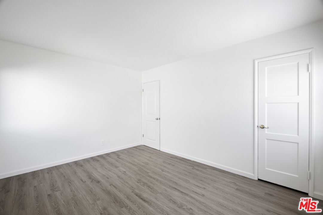 3493 Meier Street Los Angeles, CA 90066 - Photo 15 of 31 a view of an empty room with wooden floor