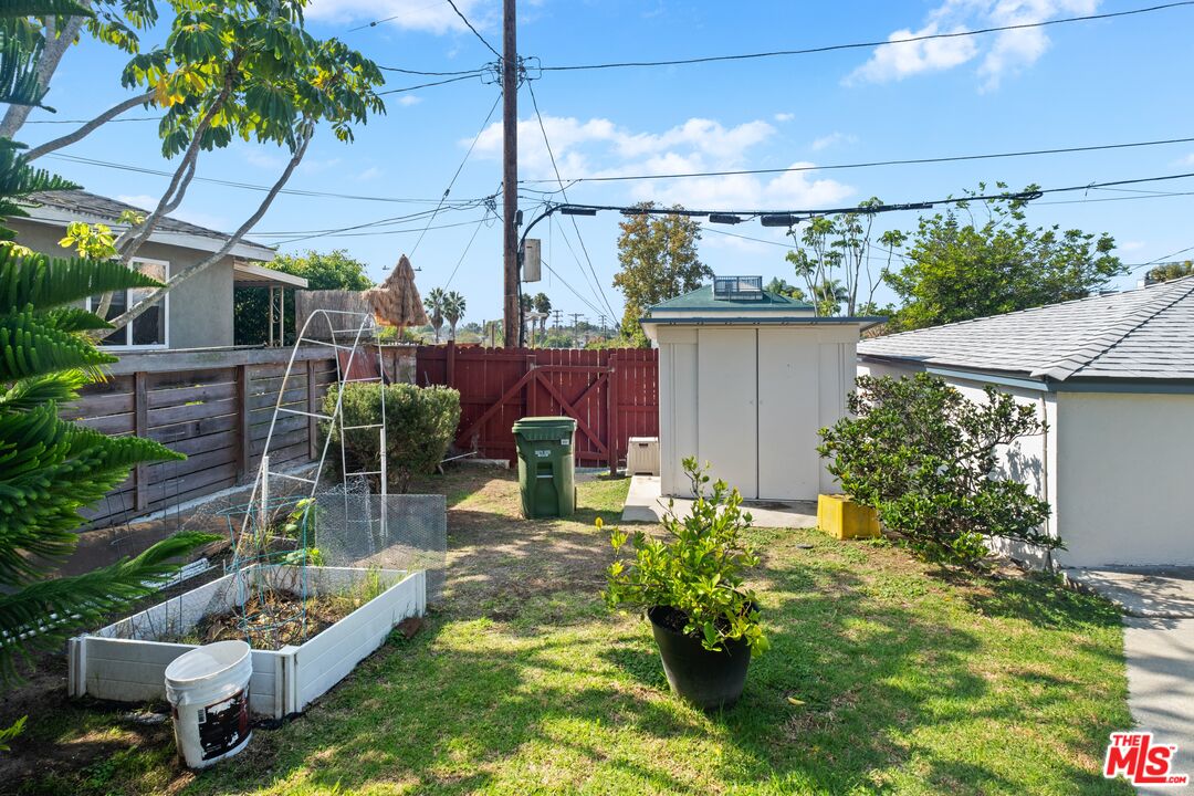 3493 Meier Street Los Angeles, CA 90066 - Photo 28 of 31 a view of a backyard with plants and a patio