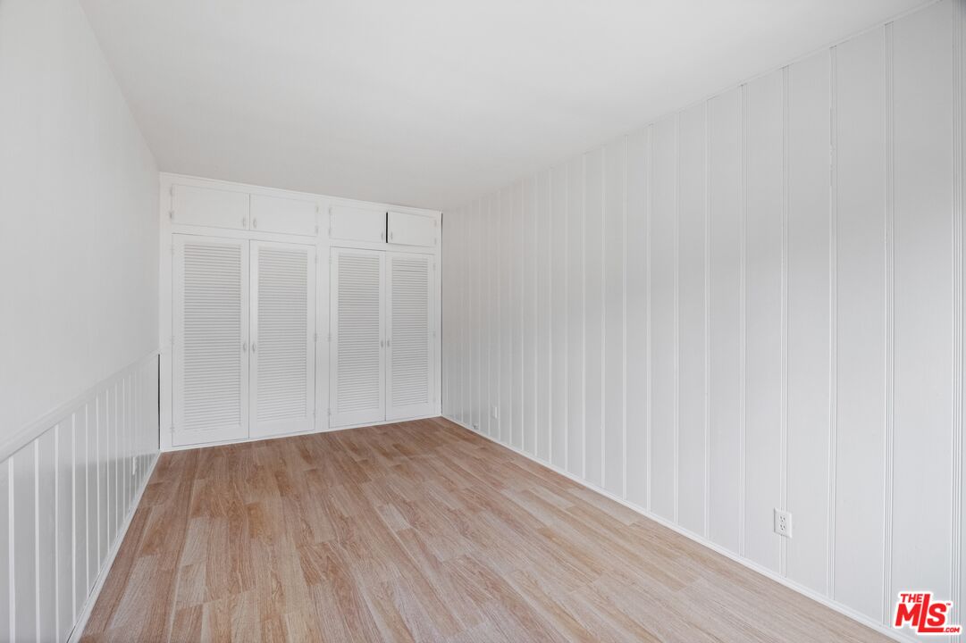 3493 Meier Street Los Angeles, CA 90066 - Photo 30 of 31 a view of an empty room with wooden floor