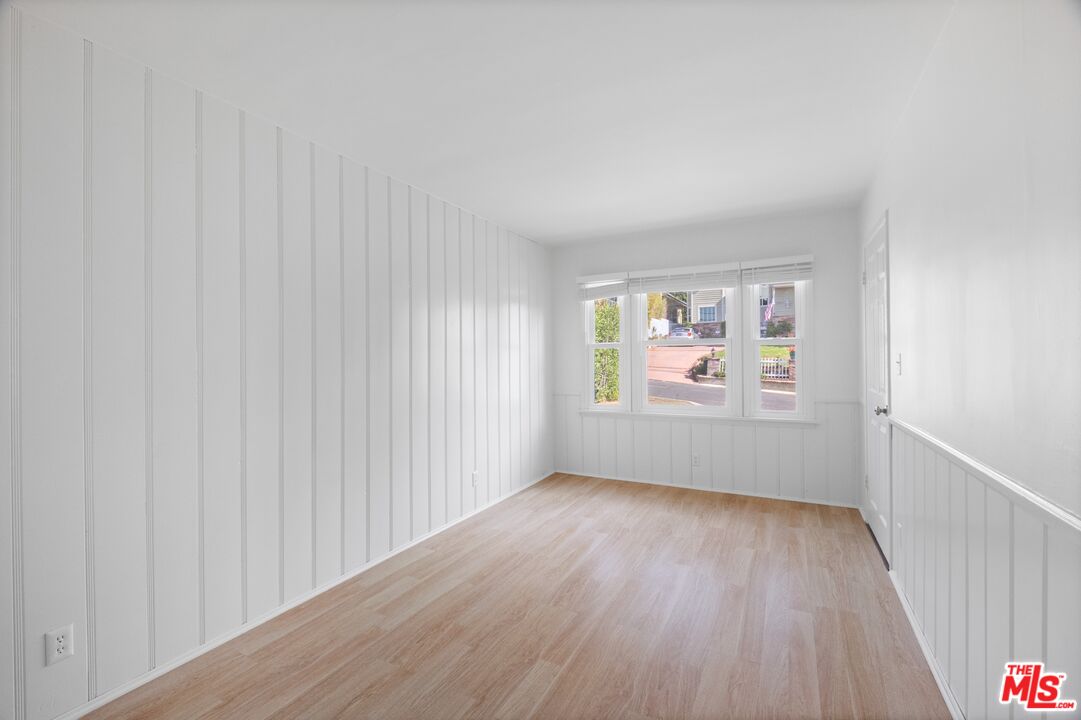 3493 Meier Street Los Angeles, CA 90066 - Photo 31 of 31 a view of an empty room with a window and wooden floor
