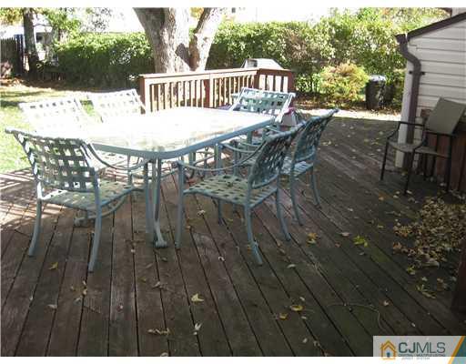 19 Baxter Road Edison, NJ 08817 - Photo 8 of 10 a view of balcony with furniture