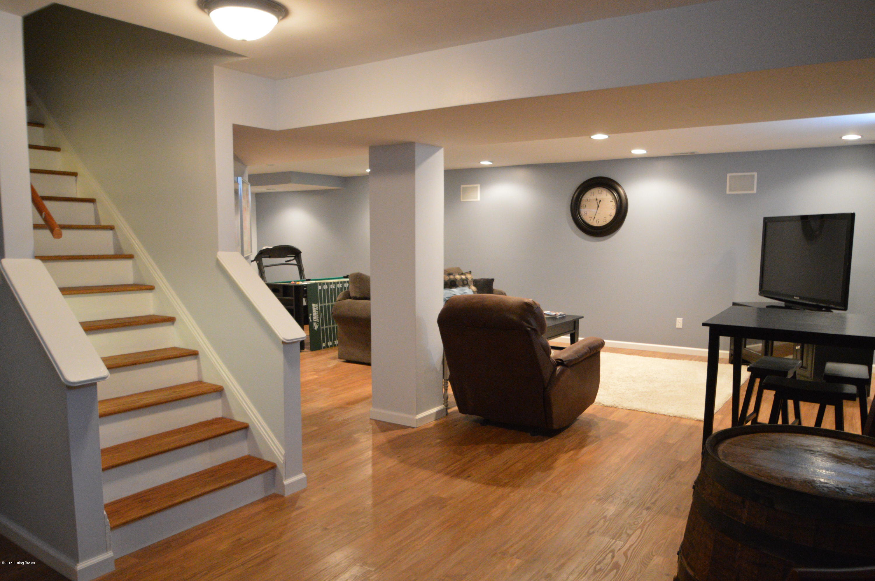 406 Old Towne Road Louisville, KY 40214 - Photo 22 of 49 Did I mention that the lower level Family room has the latest in flooring too. Vinyl Plank, looks like hardwood and wears better. Very easy to care for,