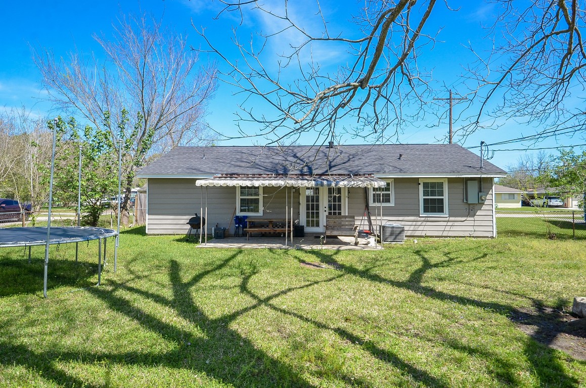 201 Inwood Lane Highlands, TX 77562 - Photo 25 of 31 a view of a house with backyard porch and sitting area