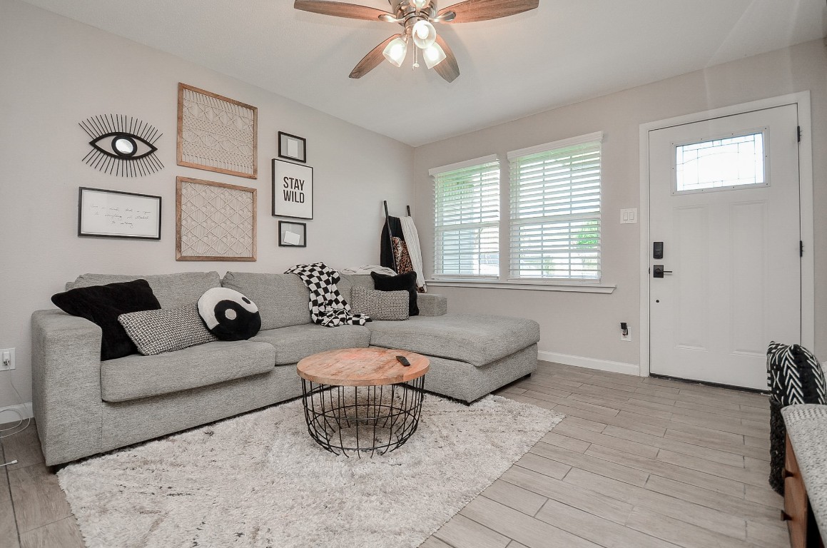 201 Inwood Lane Highlands, TX 77562 - Photo 7 of 31 a living room with furniture and wooden floor