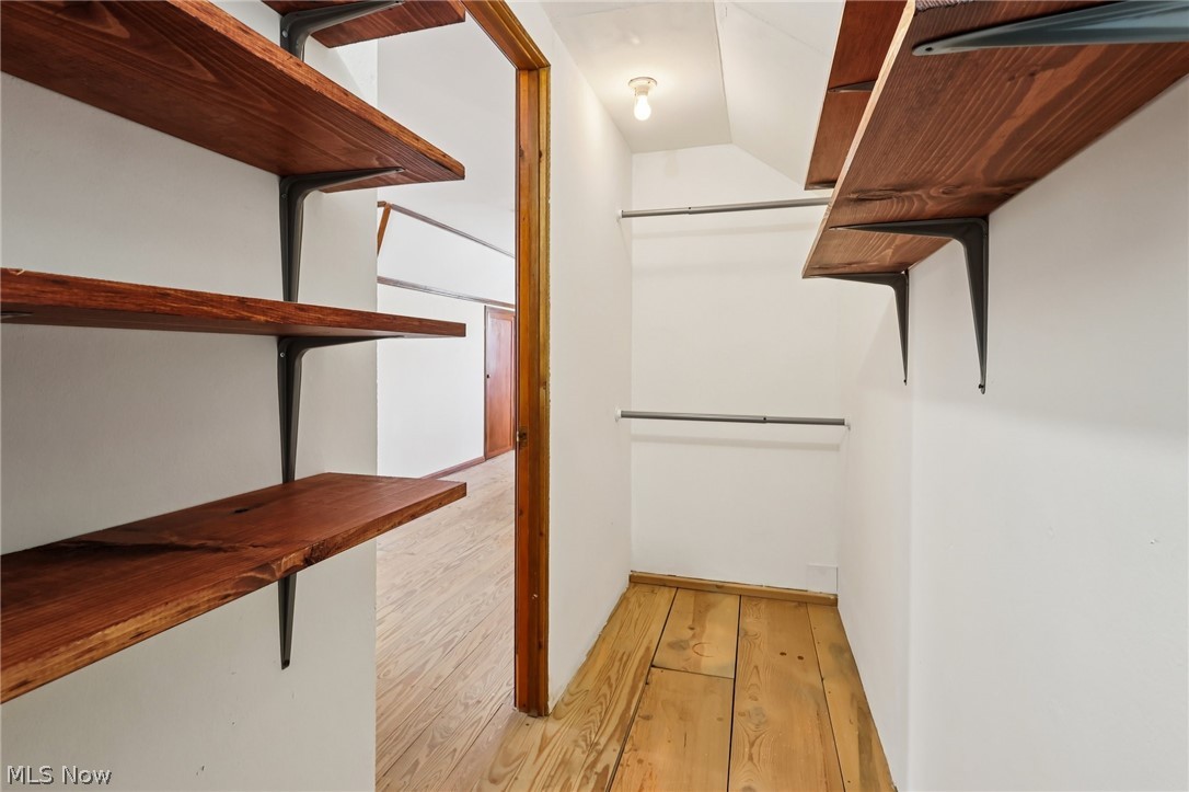 4252 Ridgeview Road Cleveland, OH 44144 - Photo 20 of 37 Walk in closet with light wood-type flooring