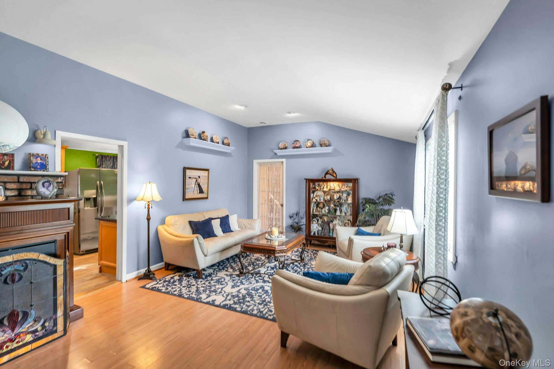 71 Ridge Haven Drive Ridge, NY 11961 - Photo 6 of 23 Living Room With Electric Fireplace