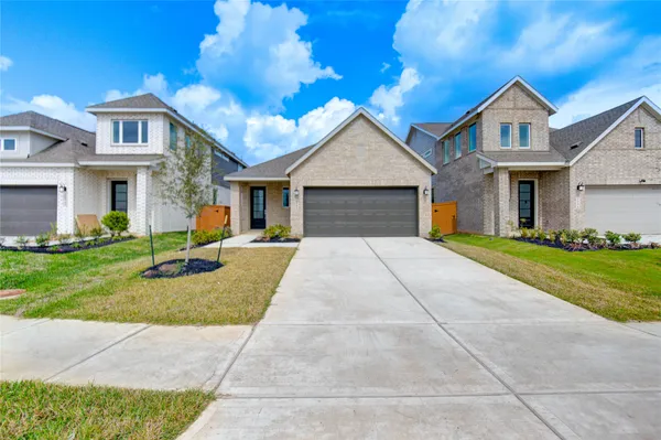 a view of outdoor space yard and front view of a house