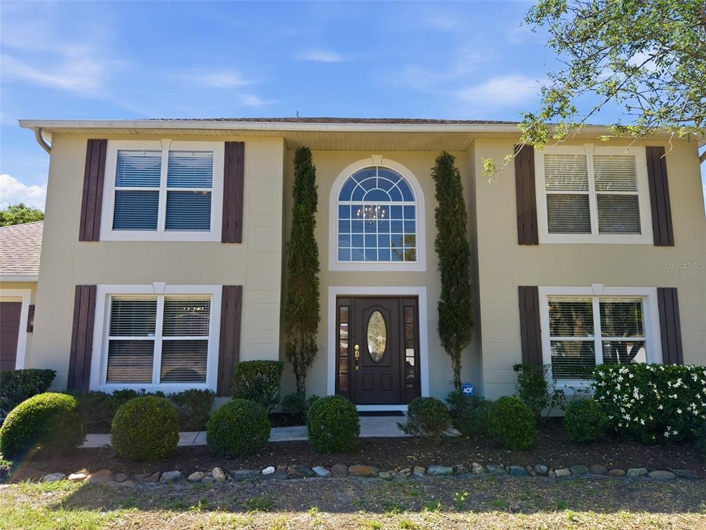 13302 Mitten Lane Spring Hill, FL 34609 - Photo 5 of 59 a front view of a house