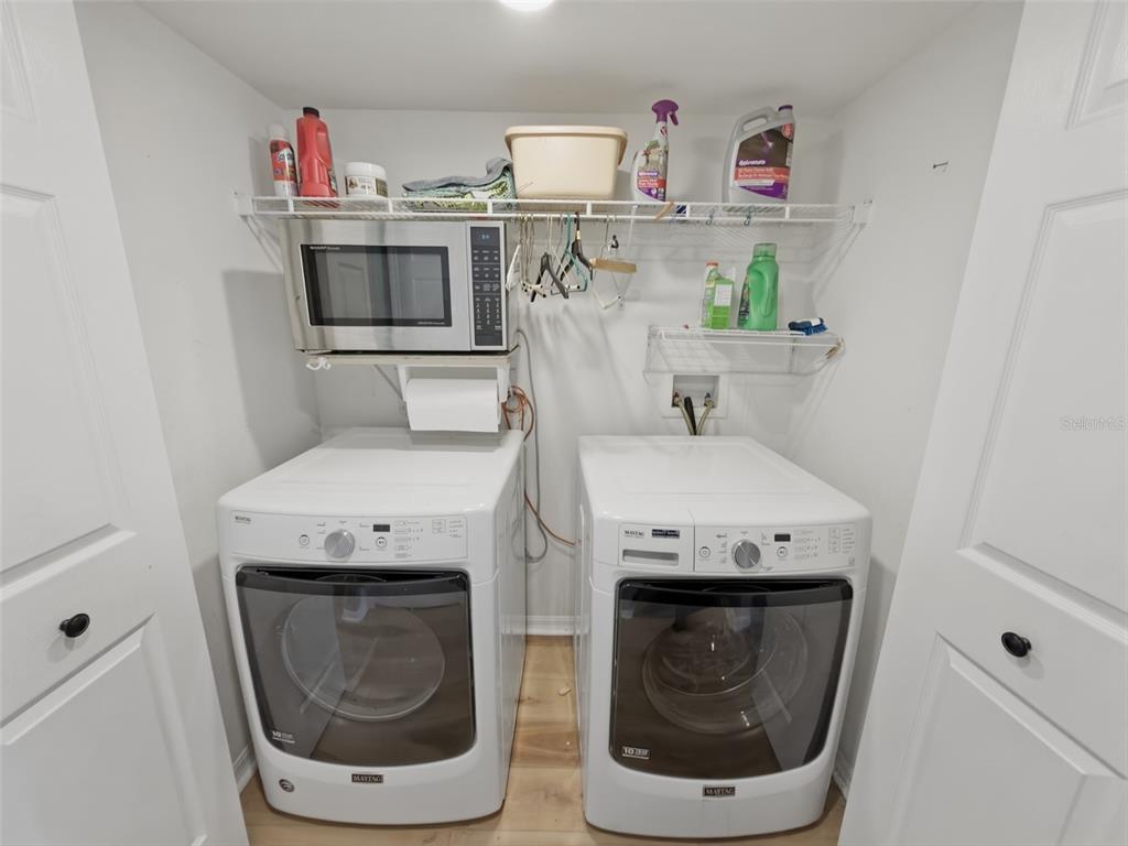 13302 Mitten Lane Spring Hill, FL 34609 - Photo 55 of 59 a utility room with dryer and washer