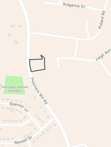 a picture of a bathroom with a white wall