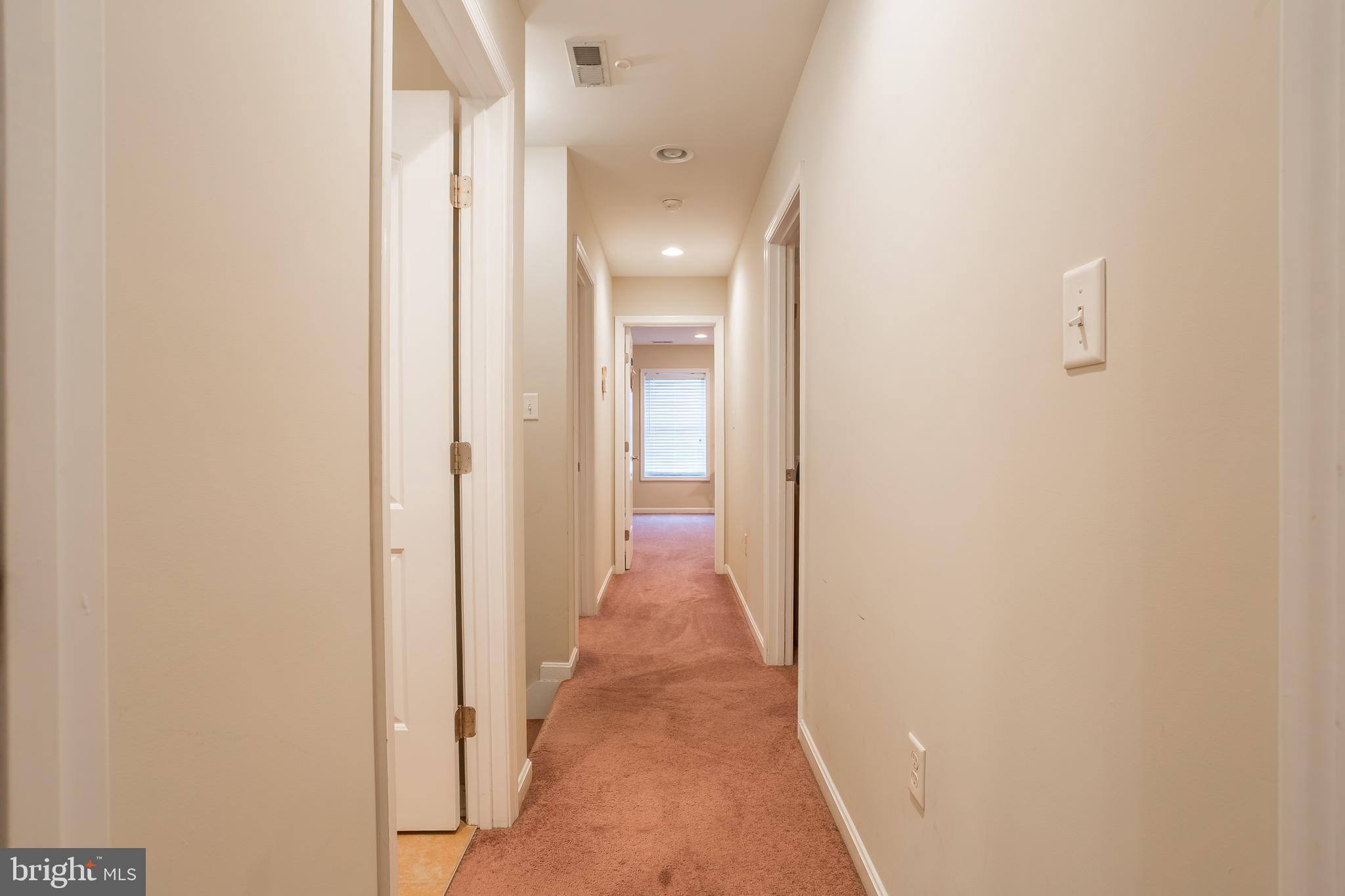 10455 Sunnyside Road Greenwood, DE 19950 - Photo 22 of 46 a view of a hallway with wooden floor