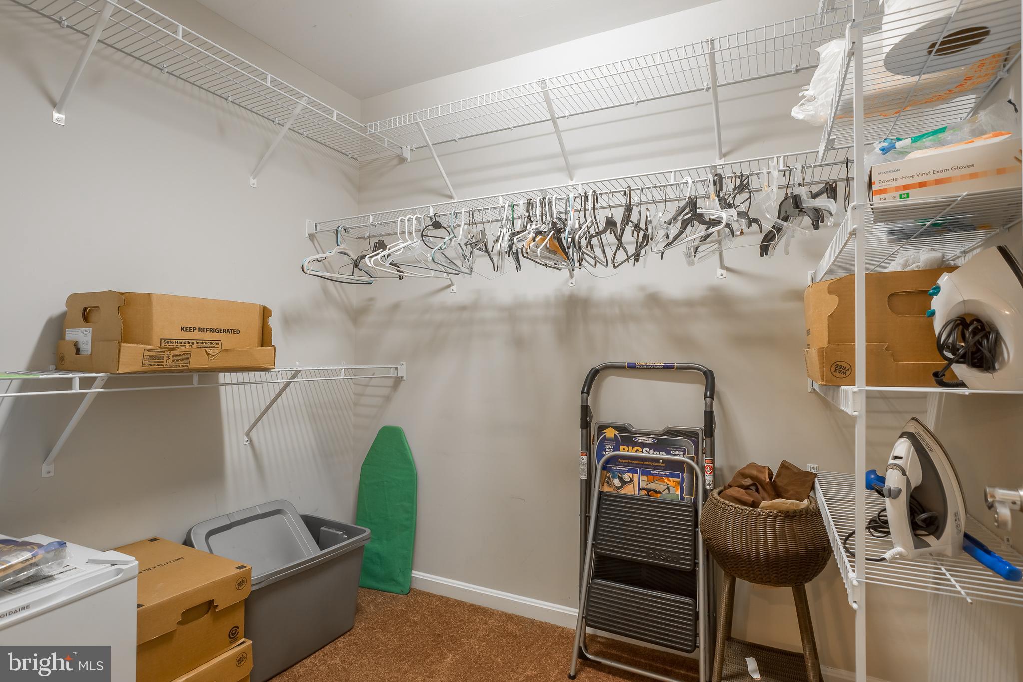 10455 Sunnyside Road Greenwood, DE 19950 - Photo 41 of 46 a view of storage and utility room with racks on the wall