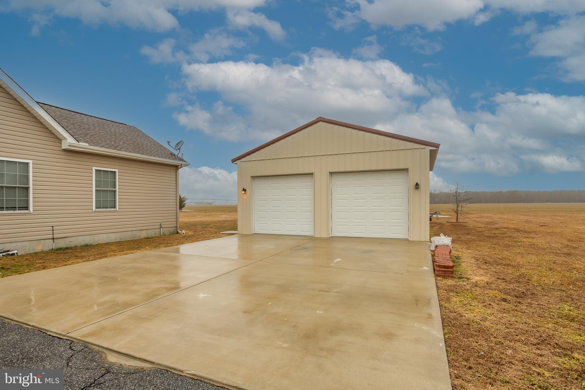 10455 Sunnyside Road Greenwood, DE 19950 - Photo 42 of 46 a view of an empty room with many windows