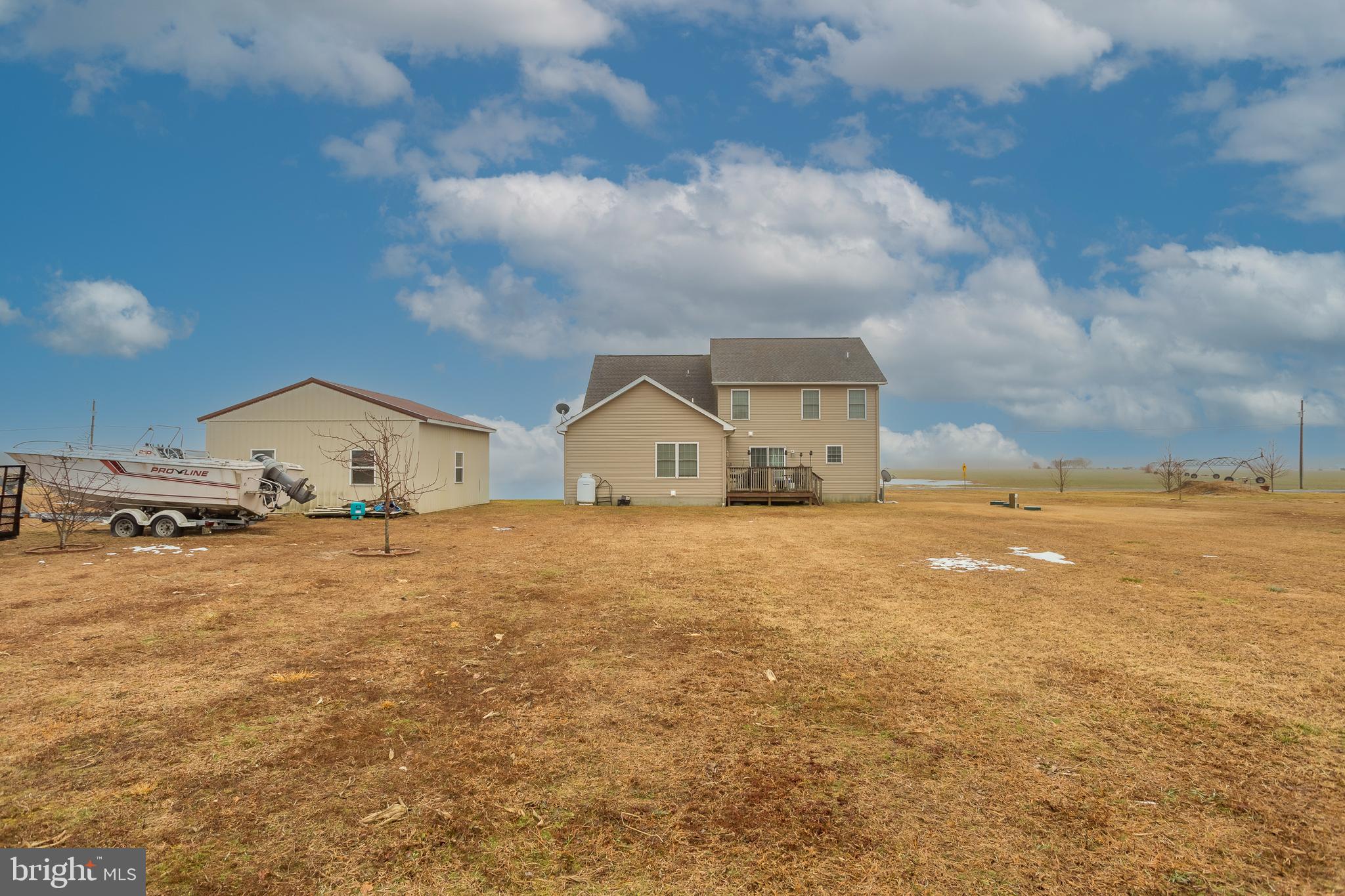 10455 Sunnyside Road Greenwood, DE 19950 - Photo 43 of 46 a view of a house next to a yard