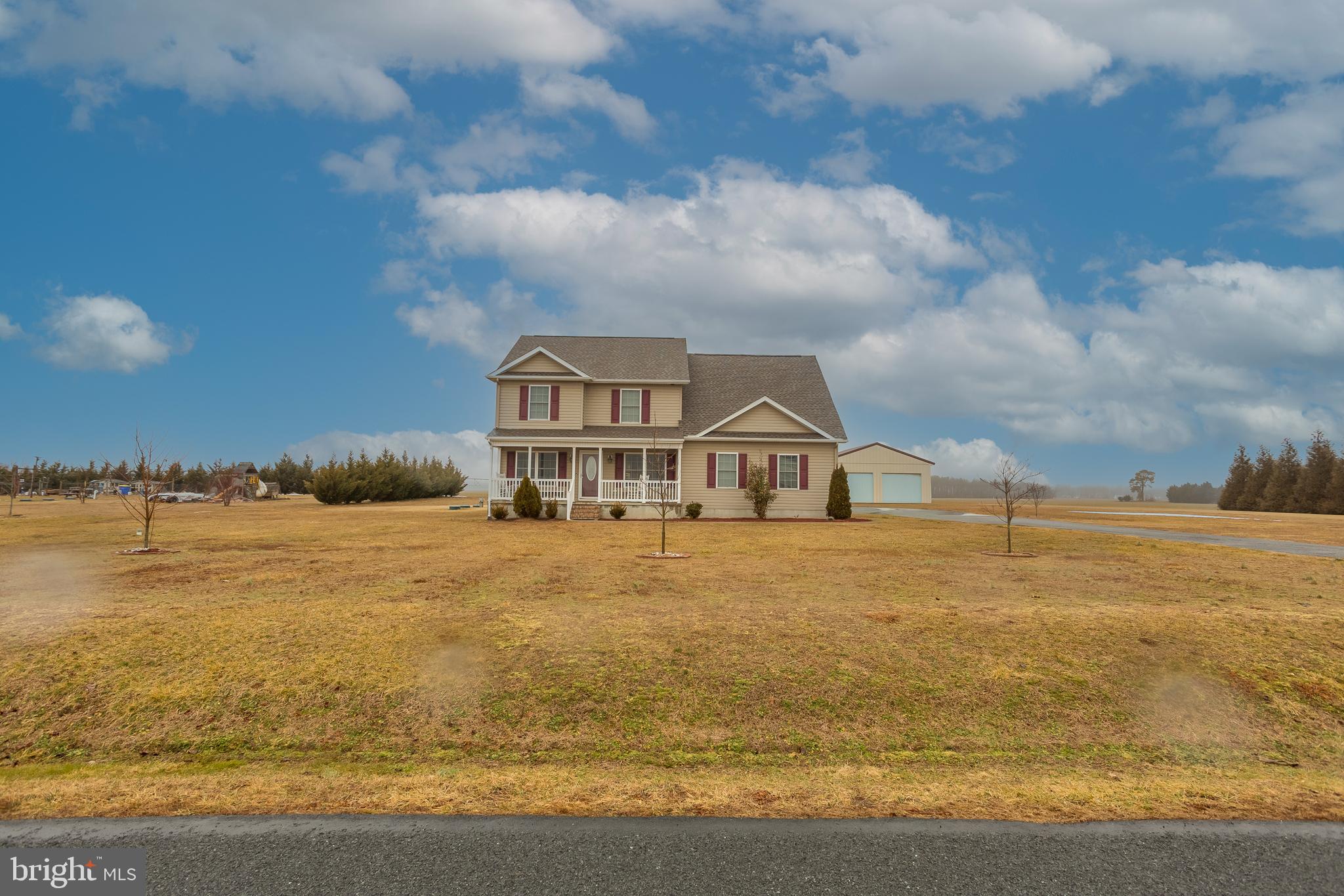 10455 Sunnyside Road Greenwood, DE 19950 - Photo 8 of 46 a view of a lake with a big yard