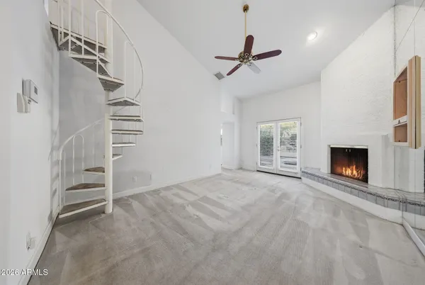 a bathroom with a double vanity sink mirror and a bathtub