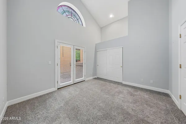 a view of an empty room with a window