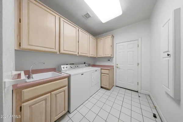 a view of cabinets and window