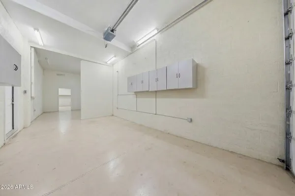 a view of a swimming pool with an outdoor seating