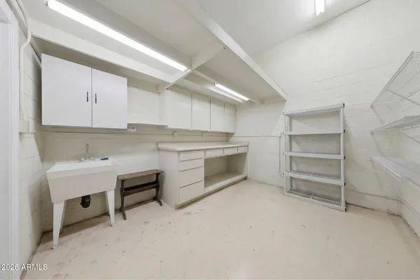 a view of a swimming pool with an outdoor seating