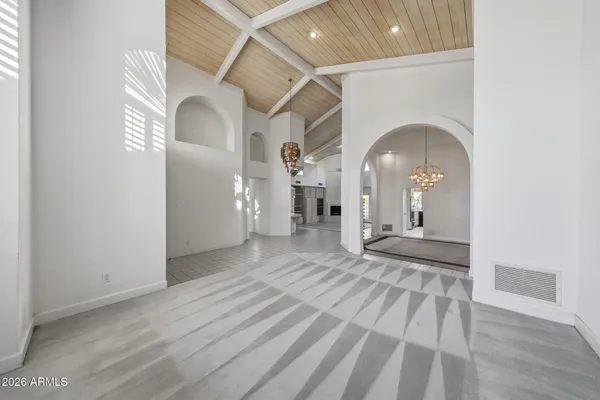a view of a livingroom with wooden floor