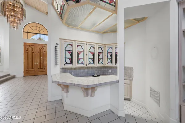 a kitchen with a stove and a sink