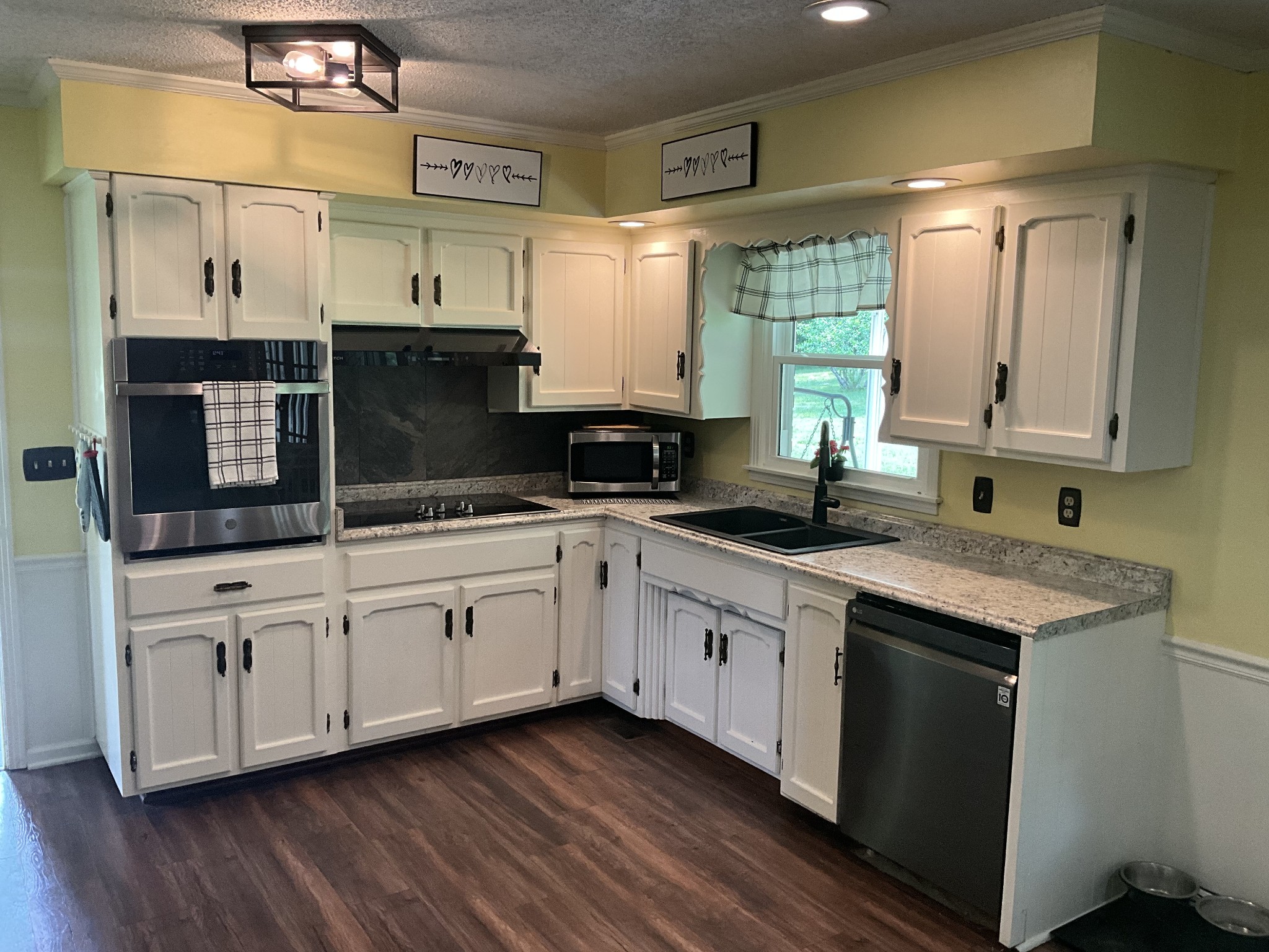 5247 Stacy Springs Road Springfield, TN 37172 - Photo 9 of 29 a kitchen with sink cabinets and window