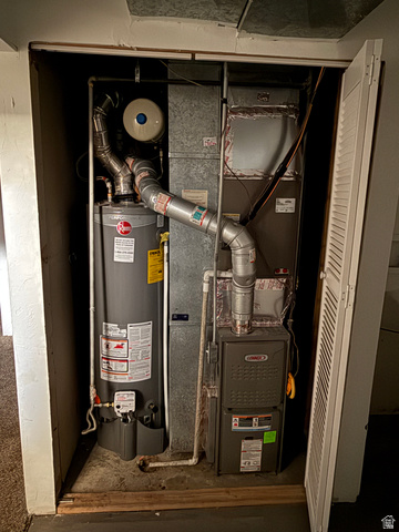 874 770 South Tooele, UT 84074 - Photo 18 of 19 Utility closet featuring a water heater and furnace unit