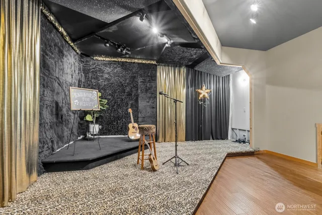 a living room with a couch and a rug