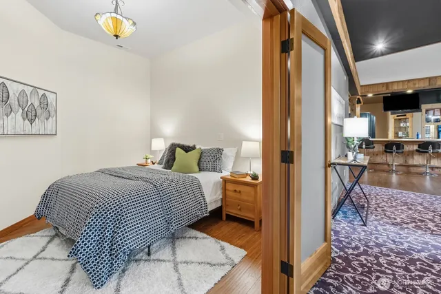 a en suite bathroom with a sink and a mirror