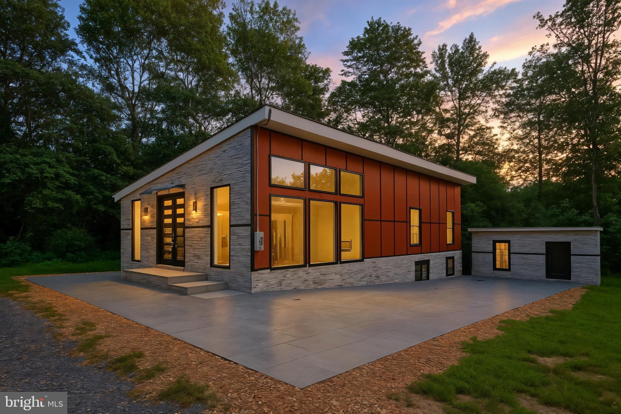 12116 Old Fort Road Fort Washington, MD 20744 - Photo 2 of 65 a view of a house with backyard and sitting area