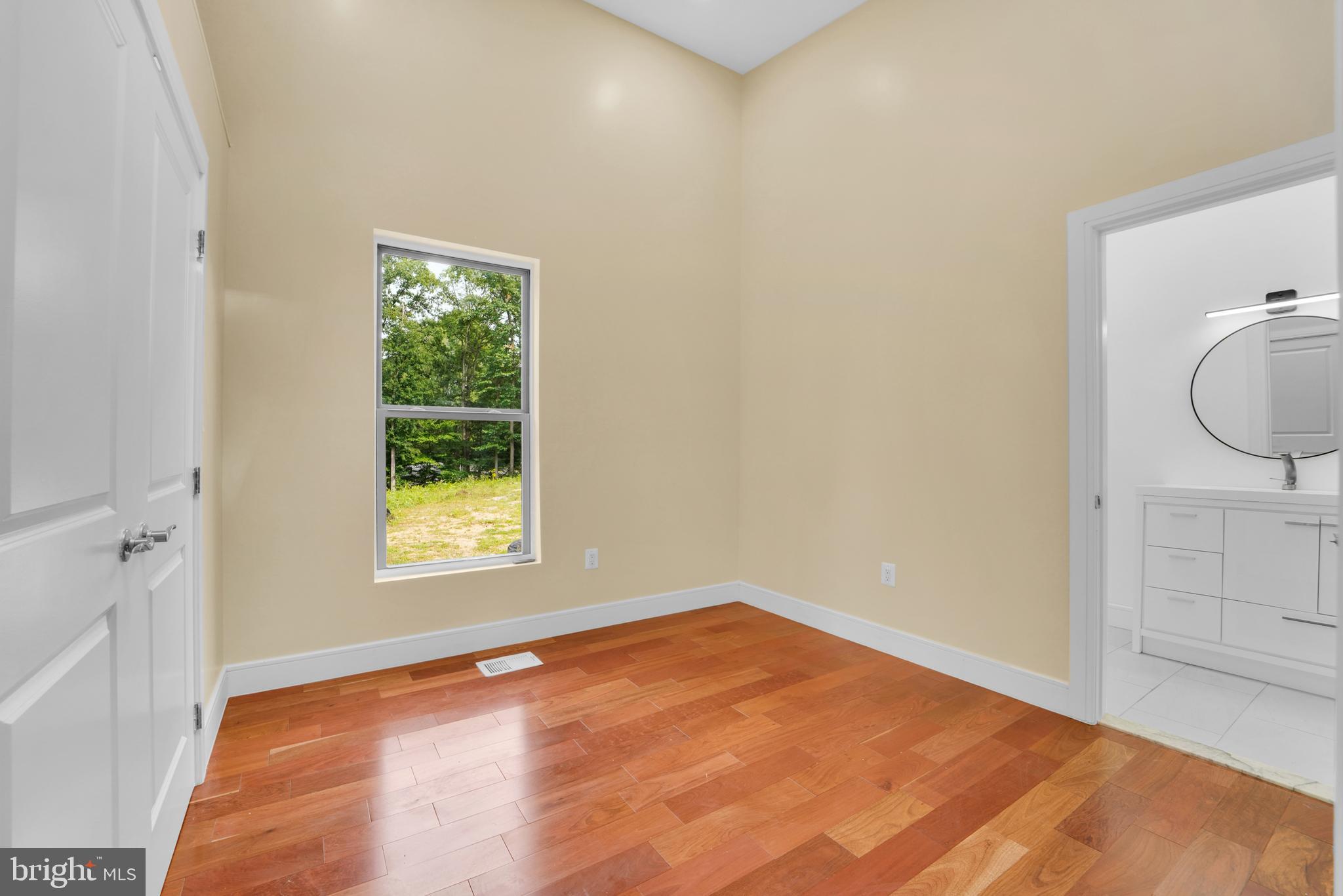 12116 Old Fort Road Fort Washington, MD 20744 - Photo 22 of 65 an empty room with windows and closet