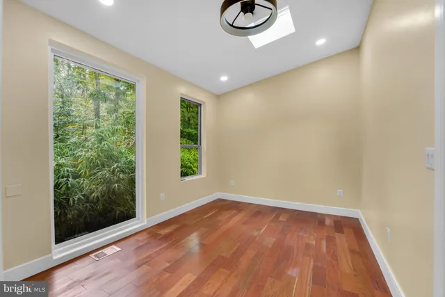 a view of a deck with a floor and fence