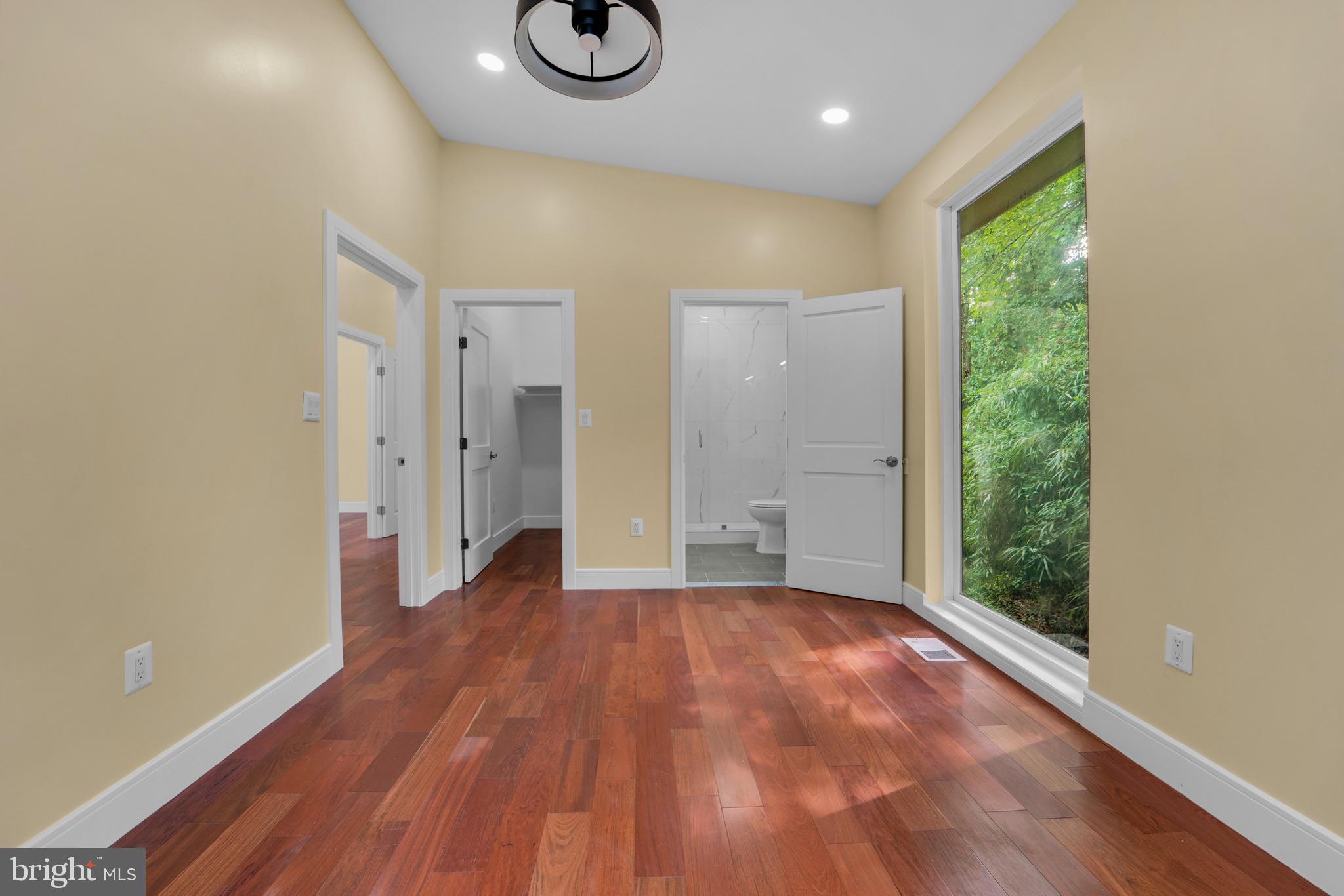 12116 Old Fort Road Fort Washington, MD 20744 - Photo 28 of 65 a view of a room with wooden floor and windows
