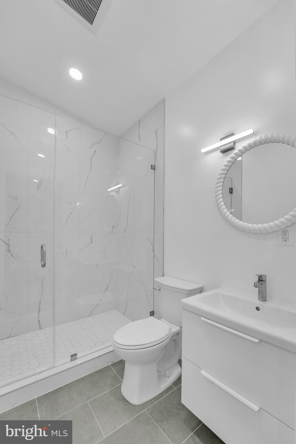 12116 Old Fort Road Fort Washington, MD 20744 - Photo 29 of 65 a bathroom with a toilet a sink and shower