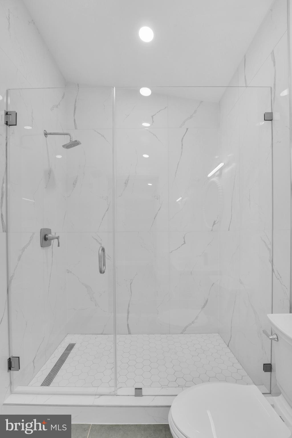 12116 Old Fort Road Fort Washington, MD 20744 - Photo 30 of 65 a bathroom with a bathtub and a shower