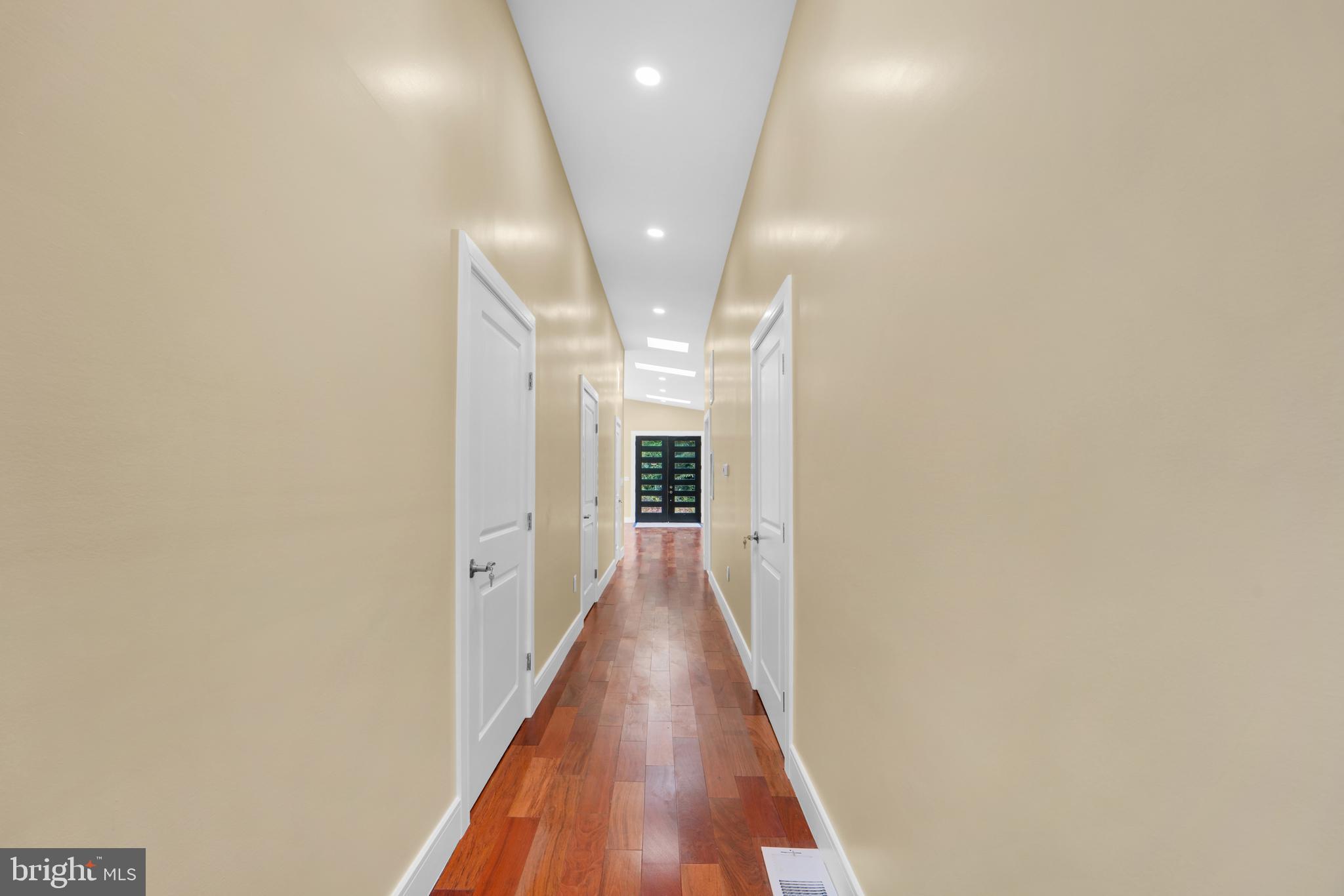 12116 Old Fort Road Fort Washington, MD 20744 - Photo 40 of 65 a view of a hallway with wooden floor