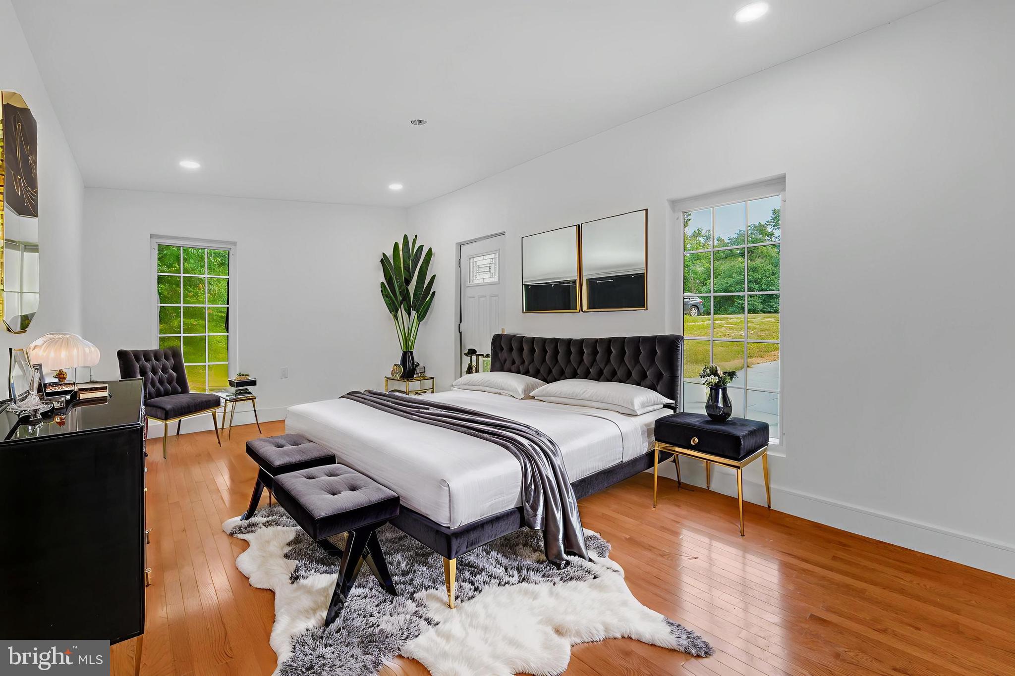 12116 Old Fort Road Fort Washington, MD 20744 - Photo 45 of 65 a bedroom with a bed and wooden floor