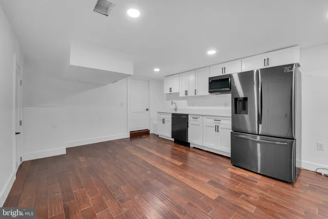 a view of a storage & utility room with washer and dryer