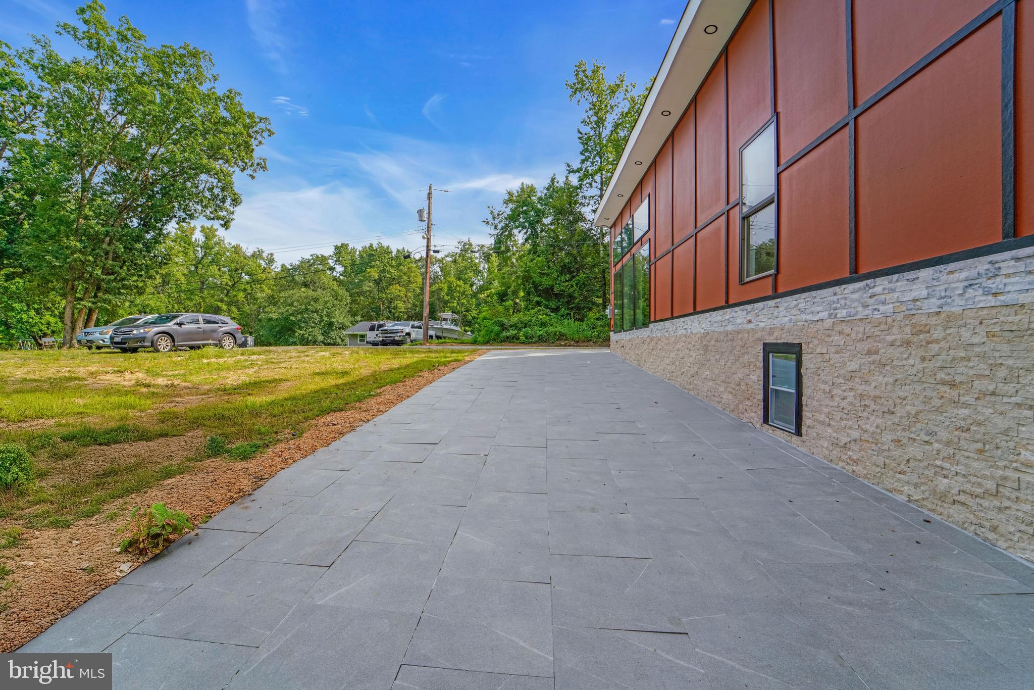 12116 Old Fort Road Fort Washington, MD 20744 - Photo 64 of 65 a view of a tall building with a yard