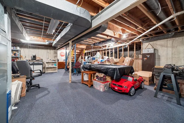 a view of a garden with sitting area